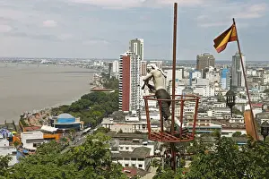 Pirate figure on Cerro Santa Ana looking on Malecon Simon Bolivar with a telescope, Guayaquil, Guayas Province, Ecuador