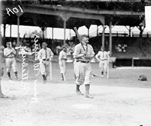 Prints of UNITED STATES - CIRCA 1910: Informal full-length portrait of baseball player Honus Wagner of the National League's Pittsburgh Pirates, holding a baseball bat and smiling MLB Legends Art Prints: Top 10 Greatest Baseball Players of All Time: Pittsburgh's Honus Wagner With Teammates