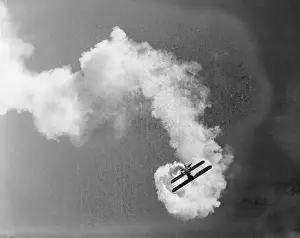 Plane Producing Dense Smoke