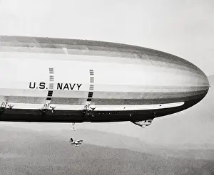 Seattle Prints: Plane Underneath Huge Dirigible in Flight