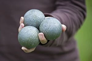 Images Dated 12th June 2011: Player holding Boules or Petanque balls in his hand, Colmar, France, Europe