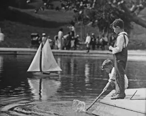 Central Park, New York Gallery: Playing With A Model Boat
