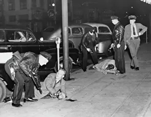 Criminal Prints: Polce Cover Wounded Holup Suspects