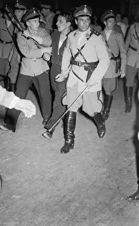 Oppression Prints: Police Arresting Peronista During Mass Meeting