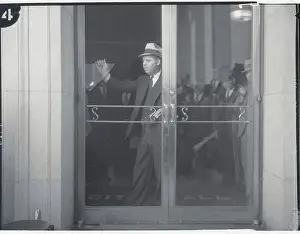 Police Captain Checking Damaged Glass