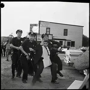 Police Carry Away Demonstrator