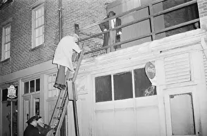 Searching Prints: Police Check Roof for Boston Strangler