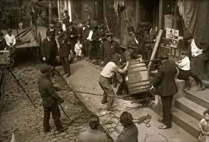 Arresting Prints: Police and Crowd Watching Men Remove Wine Barrel