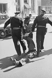 Oppression Prints: Police Dragging African-American Man