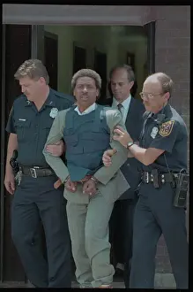 Police Escorting Sniper James Calvin Brady into Custody