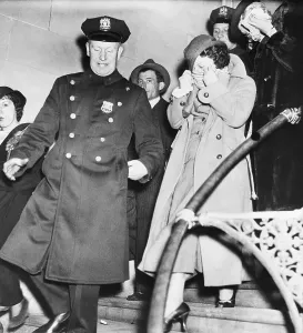 Defendant Prints: Police Lead Polly Adler Who Covers Face