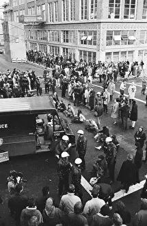 Police Monitor Sit-in Taking Place in the Street