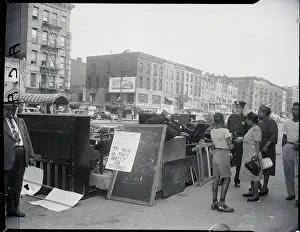 Headquarters Prints: Police Officer Next To Evicted Goods