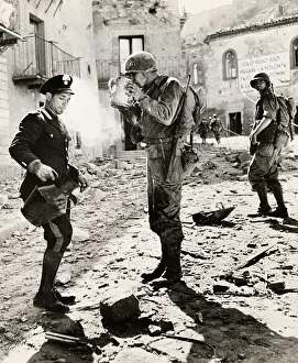 Huty32306 Prints: Police Officer Greets US Troops With Wine
