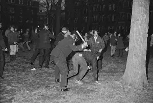 Tripping Prints: Police Officer Hitting Student at Protest