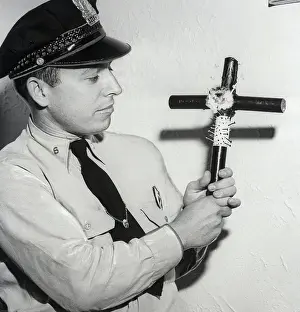 Voodoo Prints: Police Officer Holding Voodoo Cross