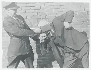 Indianapolis Prints: Police Officer Slapping Man in Face