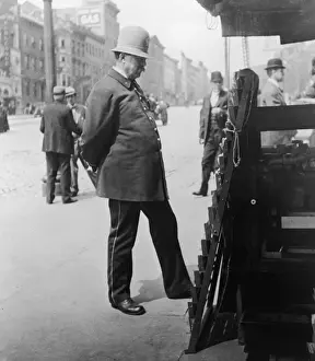 A police officer on the street, San Francisco, early 20th century