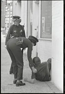 Police Officers Arresting Drunk Pedestrian
