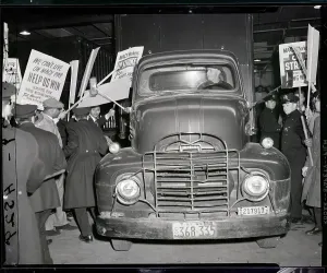 Delivery Prints: Police Stop Picketers Blocking Truck