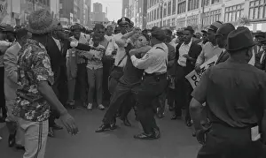 Police Struggle with Protester