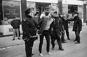 Police Subdue White Students