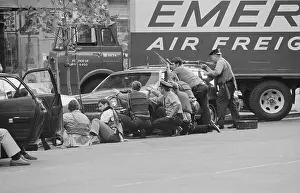 Police Taking Cover from Sniper