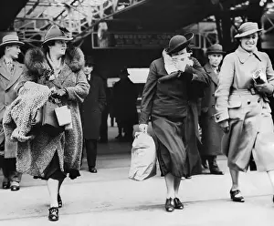 Suspect Prints: Police Women and Suspect Leaving for New York