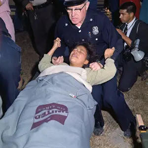 Policeman Assisting a Girl Who Fainted