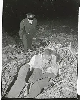 Kent Prints: Policeman Catching Couple Laying in Corn Husks