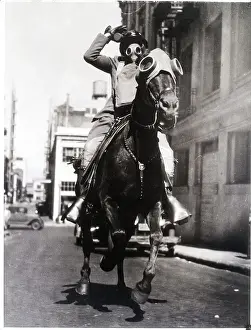 Policeman Charges Mob Of Communists