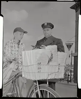 Elizabeth Prints: Policeman Checking Permit of Newsboy Delivering Papers