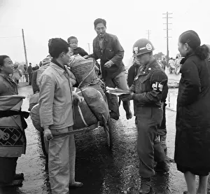 Seoul Prints: Policeman Checking Refugees
