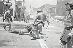 Cross Dresser Prints: Policeman Dragging Away Demonstrator