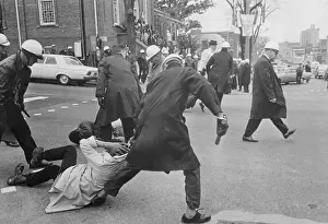 Oppression Prints: Policeman Dragging Demonstrator on the Street