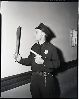 Handgun Prints: Policeman Holding Weapons