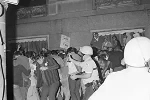 Headquarters Prints: Policeman Macing Crowd
