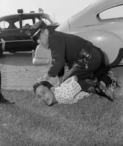 Compton Prints: Policeman Restraining Suspect