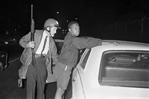 Nashville Prints: Policeman Searching Youth