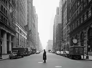 Policeman Standing on Deserted Street