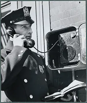 Policeman Talking on Phone