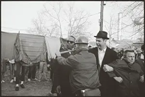 Selma Prints: Policeman Using Club To Restrain Man