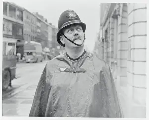 Policeman Wearing Rain Attire