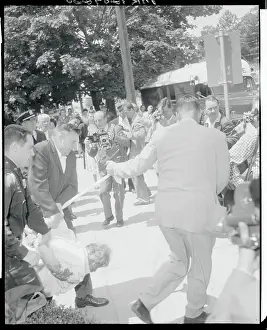 Policemen Carrying a Man Out of His Apartment
