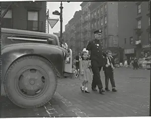 Policemen Escorting Children Across Street