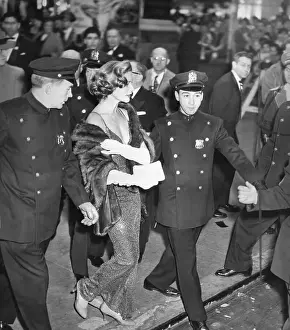 Policemen Escorting Lauren Bacall