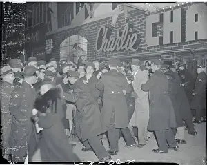 Policemen Holding Back Crowds