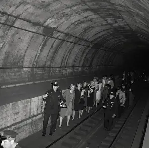 Power Outage Prints: Policemen Leading Subway Passengers to Safety