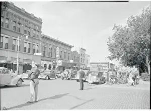 Policemen Observing Traffic on Main Street