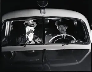 Steering Wheel Prints: Policemen in Patrol Car